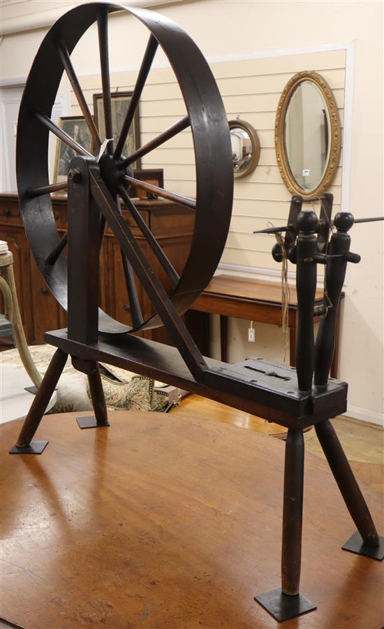 A 19th century treen spinning wheel H.113cm